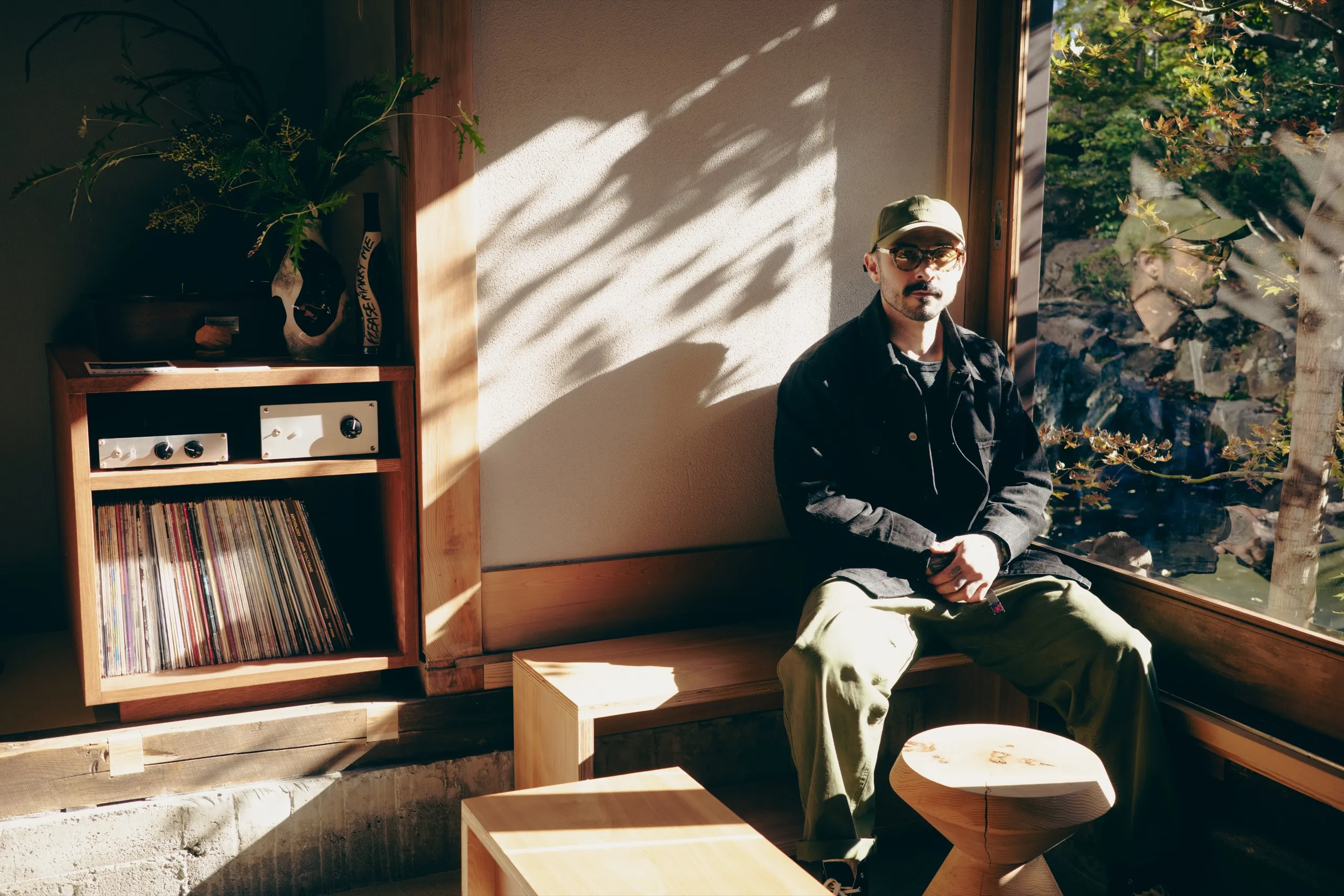 Matt Martinez seated by a window
